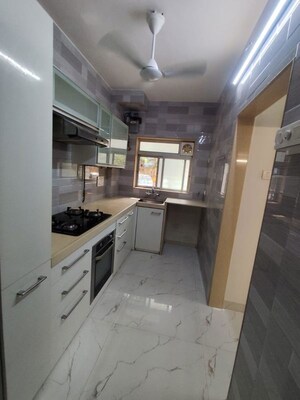 Kitchen in 1 BHK Apartment at Om Sadguru CHS, Ic Colony – for Rent