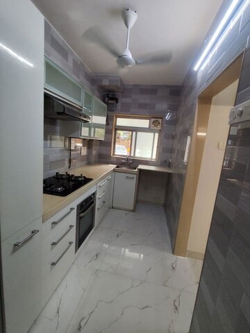 Kitchen in 1 BHK Apartment at Om Sadguru CHS, Ic Colony – for Rent