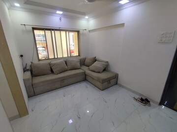 Living Room in 1 BHK Apartment at Om Sadguru CHS, Ic Colony – for Rent