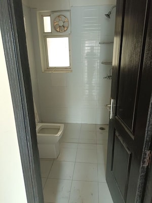 Bathroom in 2 BHK Apartment at Aims Golf Avenue II, Sector 75 – for Rent