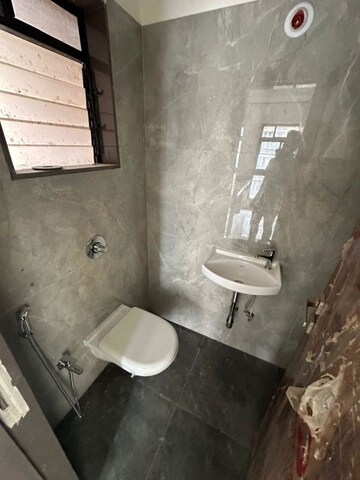 Bathroom in 3 BHK Apartment at Chaitanya Om Shivam, Borivali West – for Sale