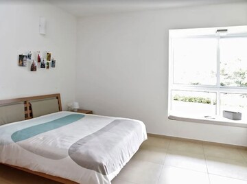 Bedroom in 2 BHK Apartment at Bhartiya City Nikoo Homes II, Thanisandra Main Road – for Rent