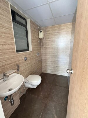Bathroom in 1 BHK Apartment at Lodha Palava Crown, Dombivli East – for Rent