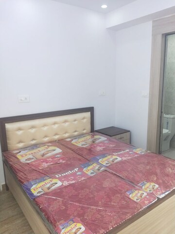 Bedroom in 1 RK Apartment at Dhoot Time Residency, Sector 63 – for Rent