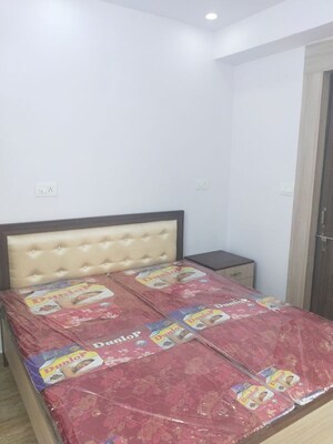 Bedroom in 1 RK Apartment at Dhoot Time Residency, Sector 63 – for Rent
