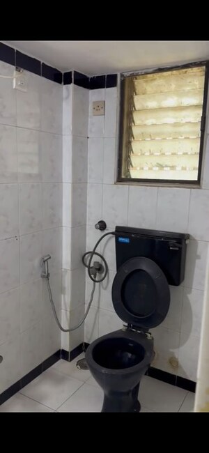 Bathroom in 1 BHK Apartment at Dheeraj Sagar, Malad West – for Rent