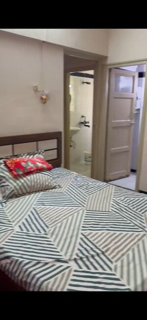 Bedroom in 1 BHK Apartment at Dheeraj Sagar, Malad West – for Rent