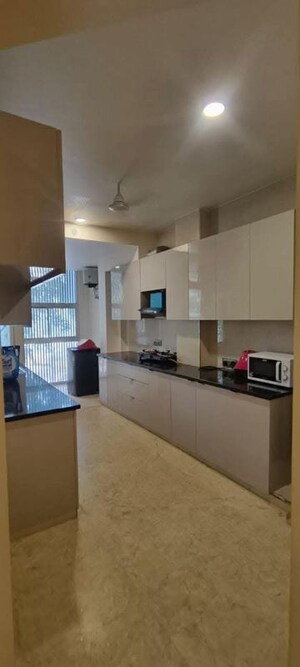 Kitchen in 4 BHK Apartment at Puri Diplomatic Residences, Sector 111 – for Rent