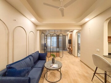 Living Room in 2 BHK Apartment at Mahindra Aura, Sector 110a – for Rent