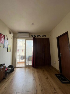Living Room in 1 RK Apartment at Urbtech Xaviers, Sector 168 – for Rent