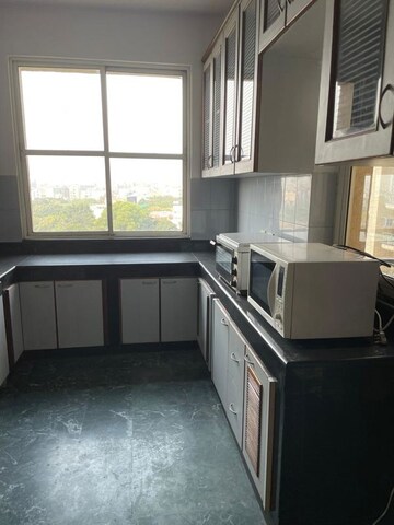 Kitchen in 3 BHK Apartment at DLF Hamilton Court, Sector 27 – for Rent