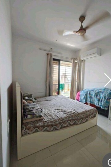 Bedroom in 1.5 BHK Apartment at Godrej Emerald, Ghodbunder Road – for Sale