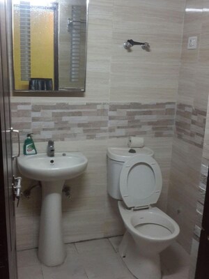 Bathroom in 2 BHK Apartment at Amrapali Princely Estate, Sector 76 – for Sale