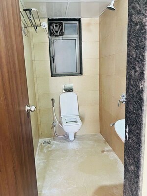 Bathroom in 2 BHK Apartment at Kalpataru Immensa, Kolshet Road – for Rent