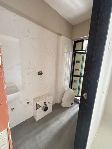Bathroom in 2 BHK Apartment at Vihang Hills, Ghodbunder Road – for Sale