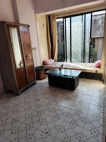 Living Room in 1 BHK Apartment at Model Town, Andheri West – for Rent