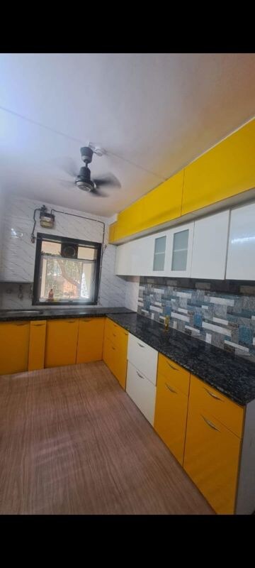 Kitchen in 2 BHK Apartment at Kamla Nagar CHS, Kandivali West – for Rent