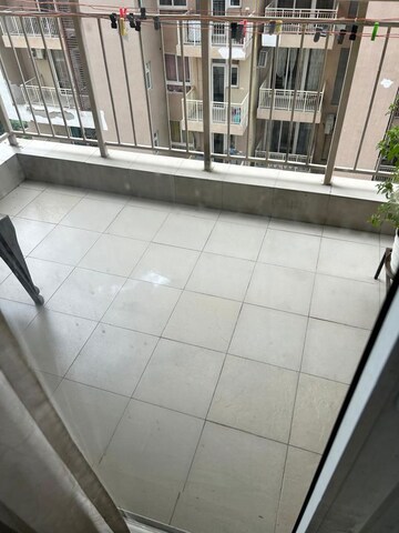 Balcony in 3.5 BHK Apartment at Emaar Palm Gardens, Sector 83 – for Rent