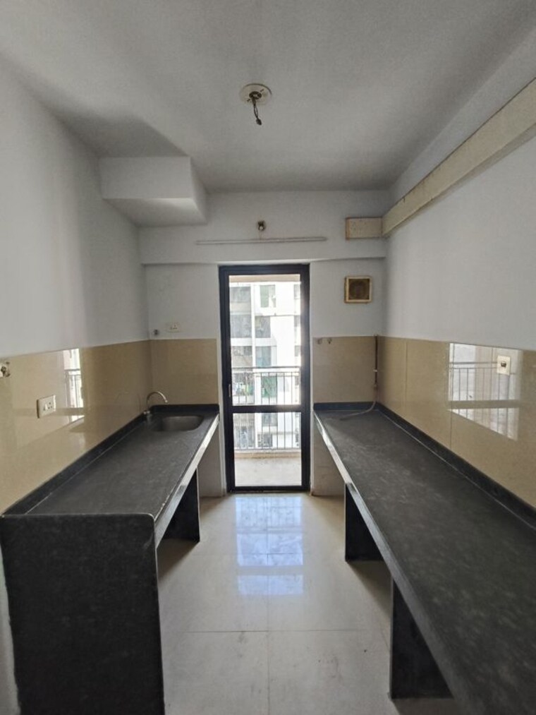 Kitchen, lodha-palava-city-lakeshore-greens 2 Bedroom 738 Sq.Ft. Apartment In Dombivli East Thane 9768932