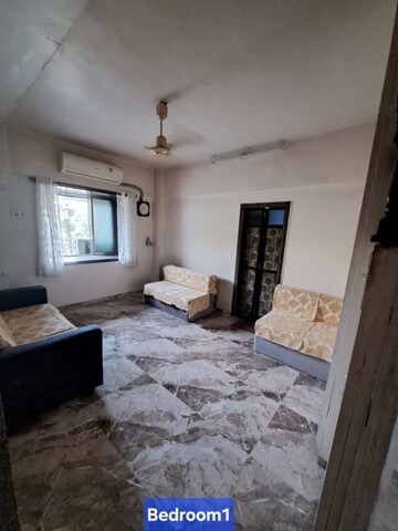 Bedroom in 2 BHK Apartment at New Haridas Park CHS, Dahisar West – for Sale