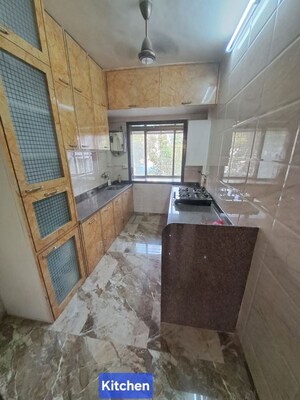 Kitchen in 2 BHK Apartment at New Haridas Park CHS, Dahisar West – for Sale