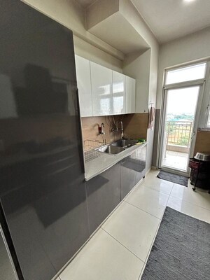 Kitchen in 3.5 BHK Apartment at Emaar Palm Gardens, Sector 83 – for Rent