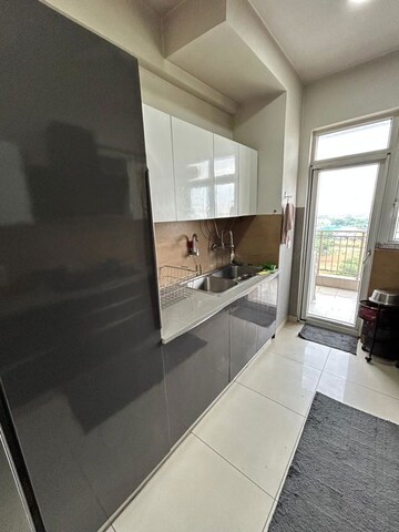 Kitchen in 3.5 BHK Apartment at Emaar Palm Gardens, Sector 83 – for Rent