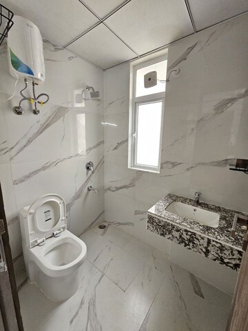 Bathroom in 2.5 BHK Apartment at Smart World Gems, Sector 89 – for Sale