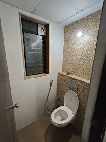 Bathroom in 1 BHK Apartment at Lodha Downtown, Dombivli East – for Rent