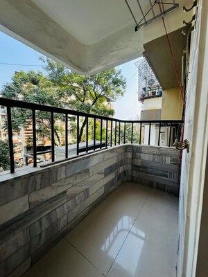 Balcony in 2 BHK Apartment at Himgiri Lokupvan Phase II CHS Ltd, Vasant Vihar – for Rent