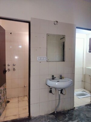 Bathroom in 1 BHK Apartment at Molarband – for Sale