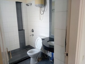 Bathroom in 3.5 BHK Apartment at Dhoot Time Residency, Sector 63 – for Rent