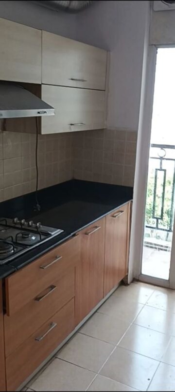 Kitchen in 3 BHK Apartment at Rishita Manhattan, Gomti Nagar – for Rent