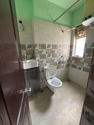 Bathroom in 2 BHK Apartment at Prateek Wisteria, Sector 77 – for Rent