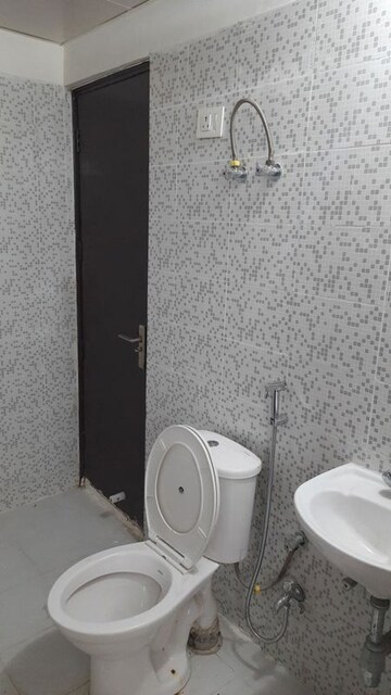 Bathroom in 3 BHK Apartment at Adore Happy Homes Grand, Sector 85 – for Sale