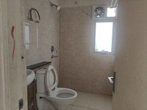 Bathroom in 2 BHK Apartment at Wave Executive Floors, Wave City – for Rent