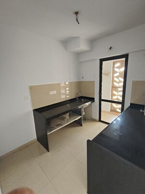 Kitchen in 2.5 BHK Apartment at Lodha Lakeshore Greens, Dombivli East – for Rent