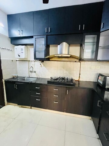 Kitchen in 2 BHK Apartment at Brahma Suncity, Wadgaon Sheri – for Rent