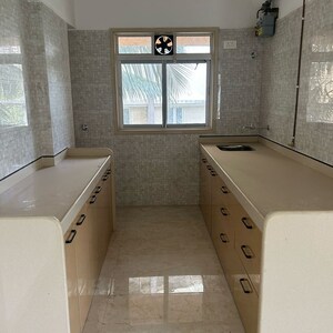 Kitchen in 2 BHK Apartment at LMP Mahesh Bhavan CHS, Goregaon East – for Sale