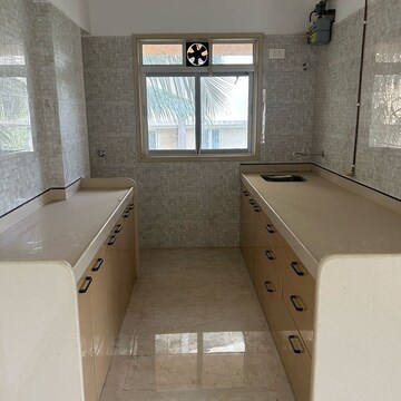 Kitchen in 2 BHK Apartment at LMP Mahesh Bhavan CHS, Goregaon East – for Sale