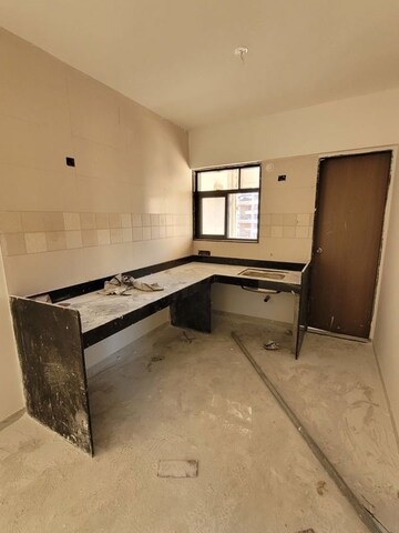 Kitchen in 2 BHK Apartment at Blue Paradise, Baner – for Sale