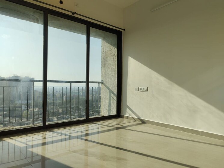 Living Room, man-opus 2 Bedroom 692 Sq.Ft. Apartment In Mira Road Thane 9771673