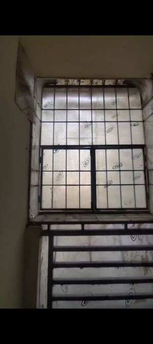 Staircase in 2 BHK Apartment at Meenal Balmukund Residency, Raj Nagar Extension – for Sale