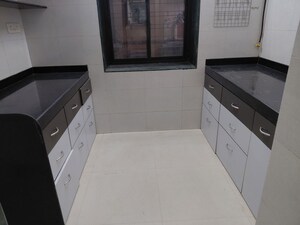 Kitchen in 1 BHK Apartment at Yashodham Complex, Goregaon East – for Sale