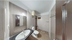 Bathroom in 2 BHK Apartment at Suncity Gloria Apartments, Sarjapur Road – for Sale