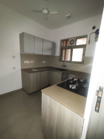 Kitchen in 2 BHK Apartment at Hiranandani Woodpark Apartment, Ghodbunder Road – for Rent