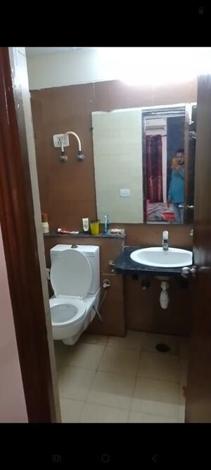 Bathroom in 2 BHK Apartment at Nimbus The Hyde park, Sector 78 – for Rent