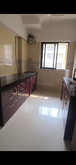 Kitchen in 2 BHK Apartment at K Raheja Palm Court, Malad West – for Rent