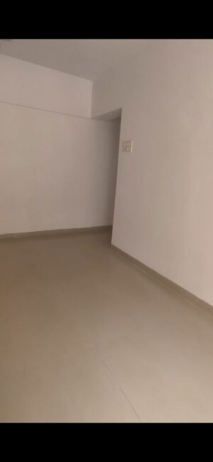 Living Room in 2 BHK Apartment at K Raheja Palm Court, Malad West – for Rent