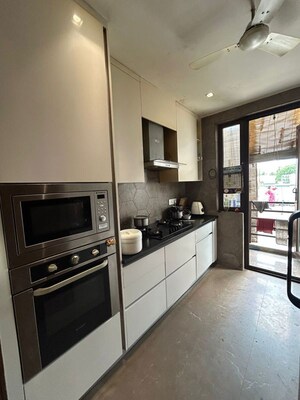 Kitchen in 4 BHK Builder Floor at South Extension ii – for Rent